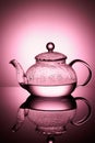 Glass teapot with boiling water and drops of condensation Royalty Free Stock Photo