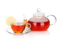 Glass teapot and cup of black tea with lemon slice Royalty Free Stock Photo