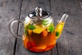 Teapot of herbal fruit tea with strawberry Royalty Free Stock Photo
