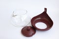 Glass teapot with plastic collapsible parts. Detailed display of the kettle