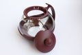 Glass teapot with plastic collapsible parts. Detailed display of the kettle