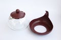 Glass teapot with plastic collapsible parts. Detailed display of the kettle