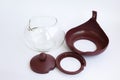 Glass teapot with plastic collapsible parts. Detailed display of the kettle