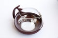 Glass teapot with plastic collapsible parts. Detailed display of the kettle