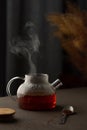 Glass teapot with rooibos tea, caffeine free