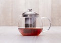 The glass teapot tea, on woodwn table Royalty Free Stock Photo