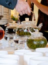 Glass teapots with fresh tea