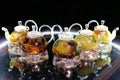 Glass teapots with tea on the table Royalty Free Stock Photo