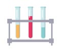 Glass test tubes on lab rack with multicolored liquid.