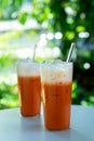 Glass of Thai iced tea with milk Royalty Free Stock Photo