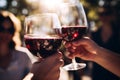 Holiday friends red drink beverage toasting people alcohol group party wine celebrate Royalty Free Stock Photo