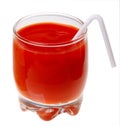 A glass of tomato juice and a straw isolated