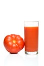 Glass of tomato juice with tomato fruit isolated on white background Royalty Free Stock Photo