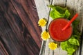 Glass of tomato juice on wooden table, closeup. Royalty Free Stock Photo