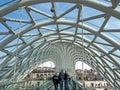 Glass top of the bridge of Peace and view of the Kura river in Tbilisi