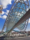 Glass top of the bridge of Peace and view of the Kura river in Tbilisi