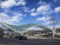 Glass top of the bridge of Peace and view of the Kura river in Tbilisi