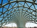 Glass top of the bridge of Peace and view of the Kura river in Tbilisi