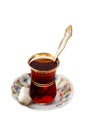 The glass of traditional Turkish tea with sugar and spoon Royalty Free Stock Photo