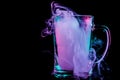 A glass with colorful smoke Royalty Free Stock Photo