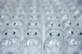 Glass transparent empty bottles assembly line Royalty Free Stock Photo