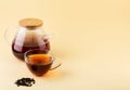 Glass transparent teapot and cup with black tea copy space Royalty Free Stock Photo