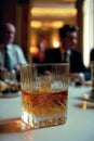 Glass tumbler of whisky in 1980s retro style