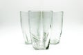 Glass tumblers on white background with selective focus ,