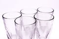 Glass tumblers on white background with selective focus ,