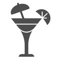 Glass with umbrella and slice of lemon solid icon, drinks concept, fresh cocktail drink with umbrella and citrus sign on Royalty Free Stock Photo