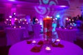 Glass vase with red roses water and light candles Royalty Free Stock Photo