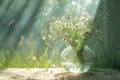 Glass Vase with wildflowers, daisies in sunlight on the window. Royalty Free Stock Photo