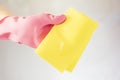 through the glass view of hand in pink glove cleaning window with sponge and spray cleaning f Royalty Free Stock Photo