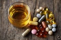 Vitamin Drink and Immune Support Supplements Arranged on Wooden Surface for Healthy Lifestyle Choices Royalty Free Stock Photo