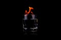Glass with vodca and fire flame Royalty Free Stock Photo