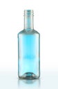 glass vodka bottle with blue flare