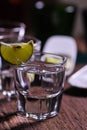 Glass of vodka shot with fresh lime Royalty Free Stock Photo