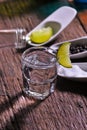 Glass of vodka shot with fresh lime Royalty Free Stock Photo