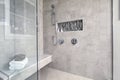 Glass walk-in shower in a bathroom of brand new home Royalty Free Stock Photo