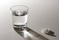 Glass of water and aspirin. Royalty Free Stock Photo