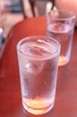 Glass water drink cool with tube on table Royalty Free Stock Photo