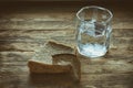 Glass of water and hunk black bread