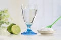 Glass of water, lemon, soda bicarbonate natureal solution Royalty Free Stock Photo