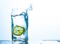 Glass of water with lemon with splash with copy space Royalty Free Stock Photo