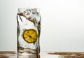 Glass of water with lemon with splash with copy space Royalty Free Stock Photo