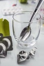 Glass of water next to an effervescent pill Royalty Free Stock Photo