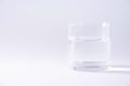 Glass of water over grey background. Copy space. Water balance Royalty Free Stock Photo