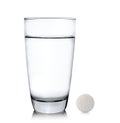 Glass of water and pills isolated on white background Royalty Free Stock Photo