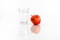 Glass of water and red apple Royalty Free Stock Photo