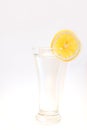 Glass of water with a slice of lemon Royalty Free Stock Photo